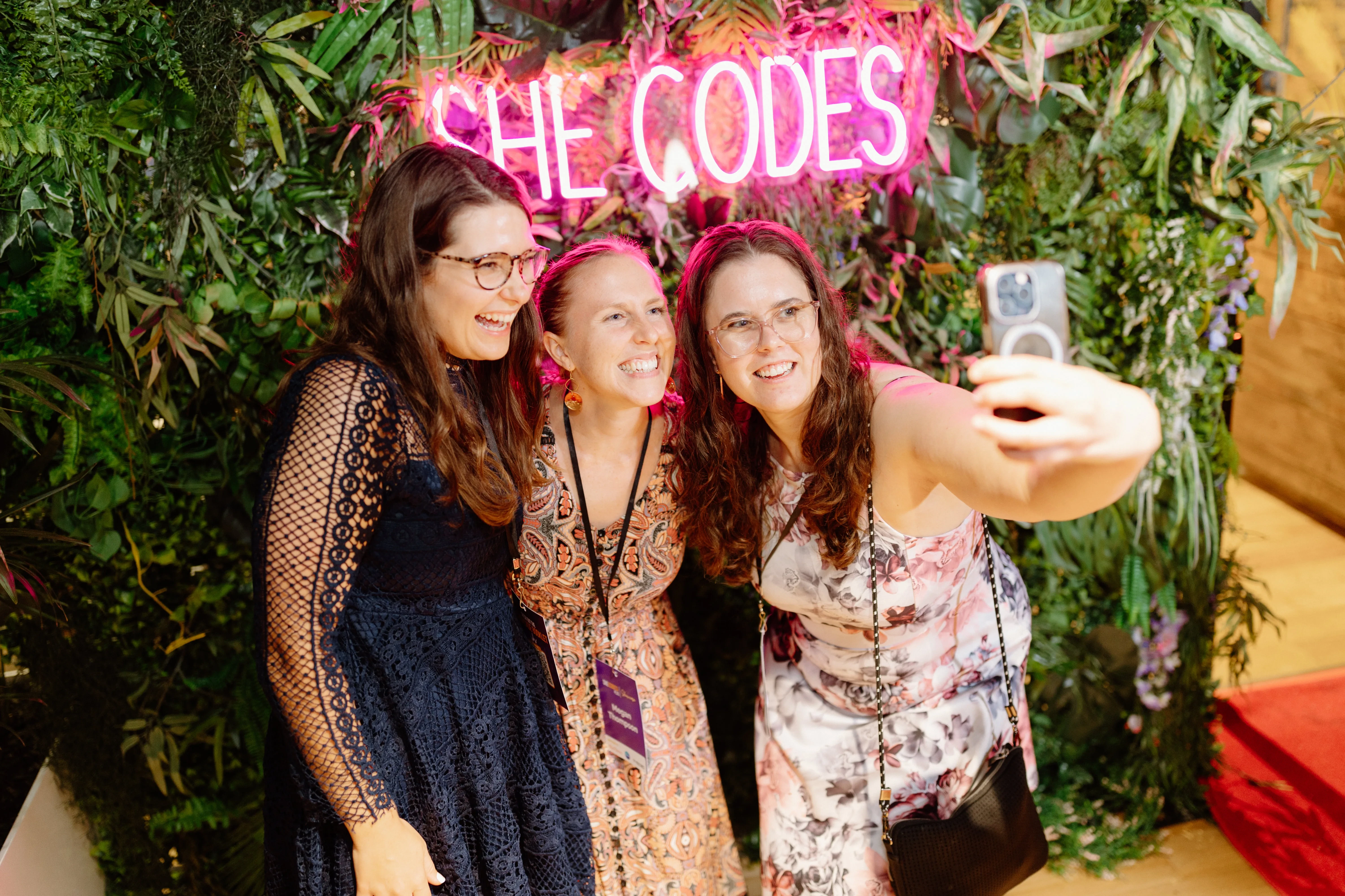 A group selfie at a She Codes Australia Brisbane event