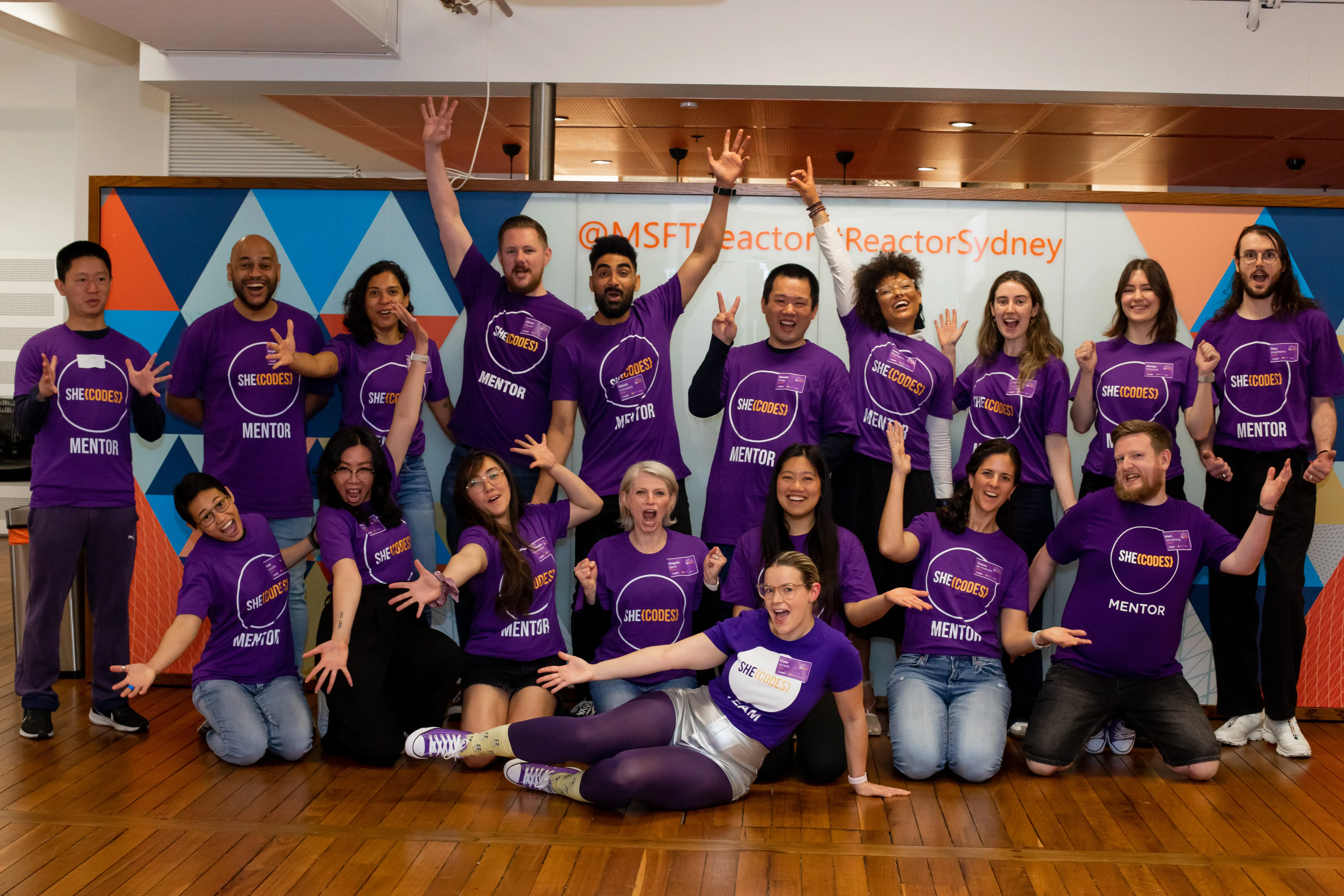 An excited group of She Codes Australia mentors at a Sydney event